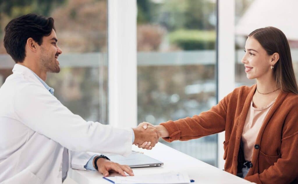 Woman meeting a doctor to begin detox for executives in New Jersey.