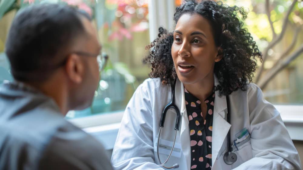 A palliative care physician consulting with a patient about carfentanil detox