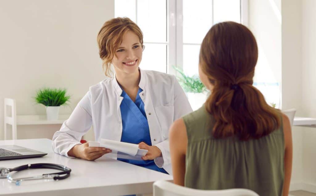 Doctor speaking with a patient during care at our drug rehab near Vineland, NJ.