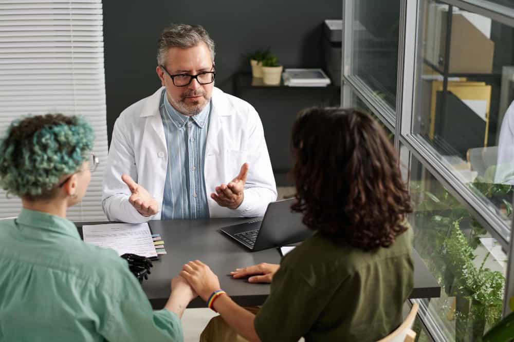 Couple speaking with doctor during kratom detox in New Jersey consultation session
