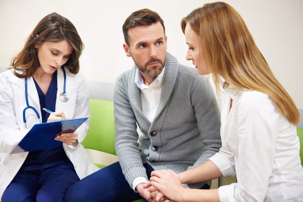 Doctor discussing treatment options during detox consultation at Enlightened Recovery Detox