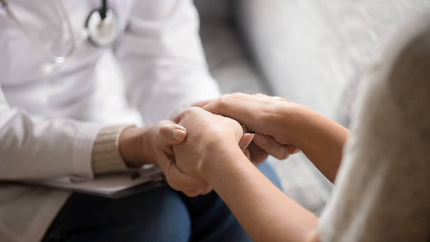 A doctor offering attentive support and direction to a patient during PCP detox in New Jersey.